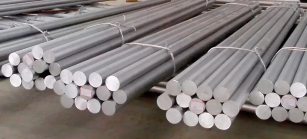 An image of four packs of 5052 aluminum round bars on a shop floor
