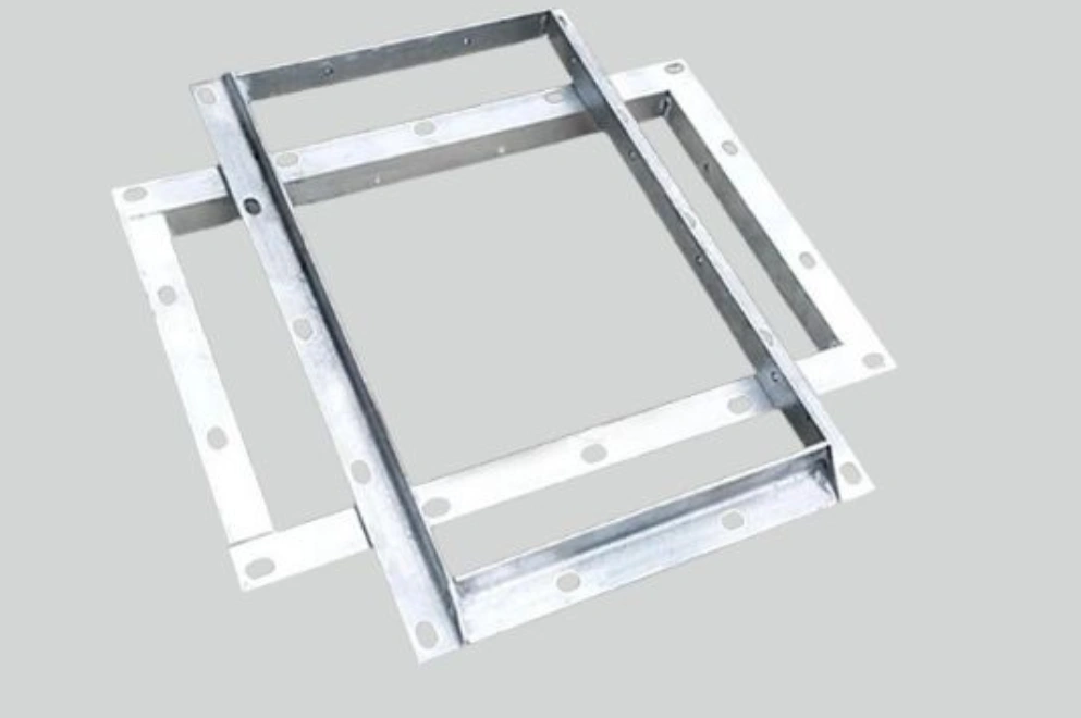 An angle sheet metal frame bracket with welded corners and mounting holes  