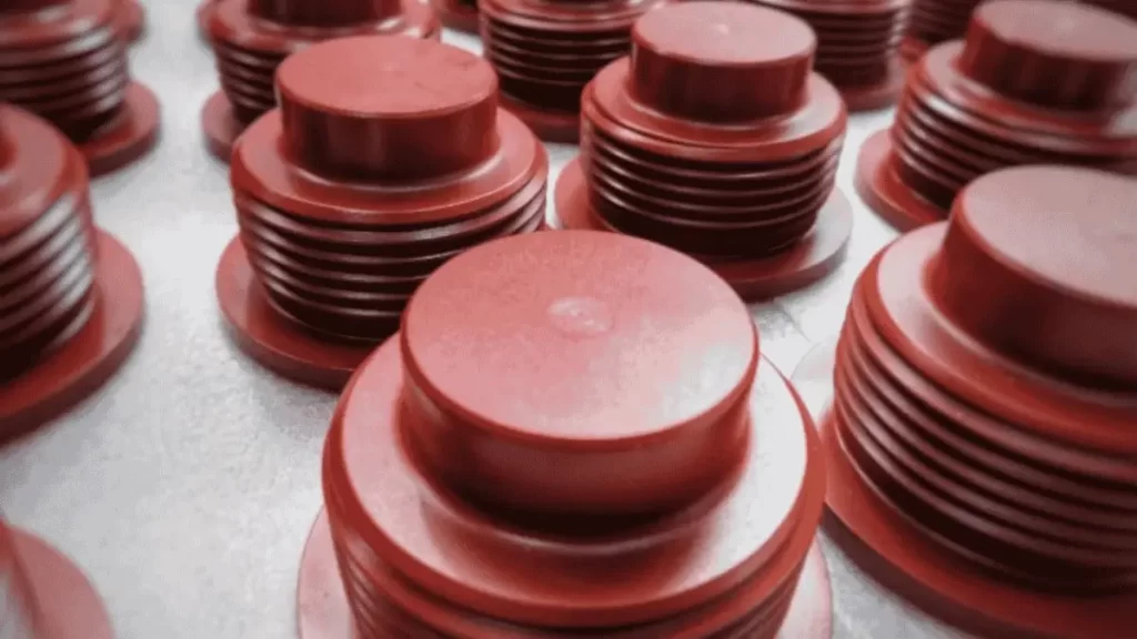 The image displays multiple parts, each with a chemical and acid-resistant paint coating.