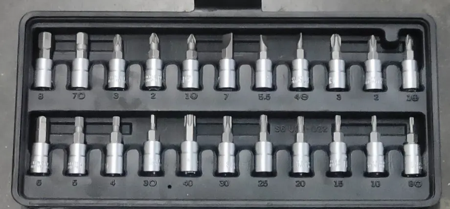 Chrome plated tool set of screw drivers in a toolbox