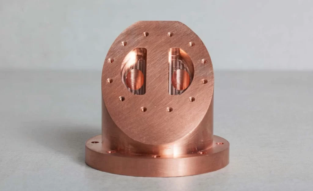 A close-up view of a copper Millied part
