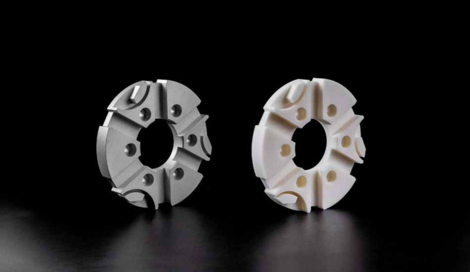 An image comparing a CNC-machined metal prototype and its white plastic replica 
