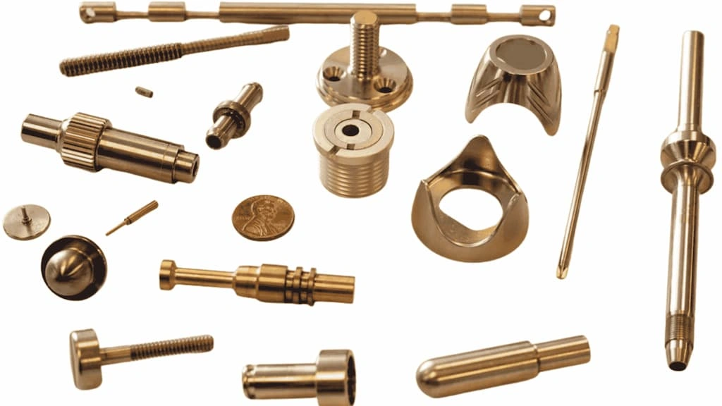 An image showing complex Swiss turned parts made with copper alloys