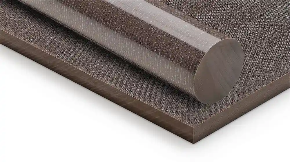 The image shows a close-up of a Delrin sheet and rod. 