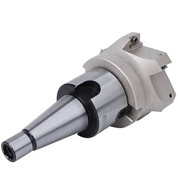 A close-up view of a face milling cutter with a white background