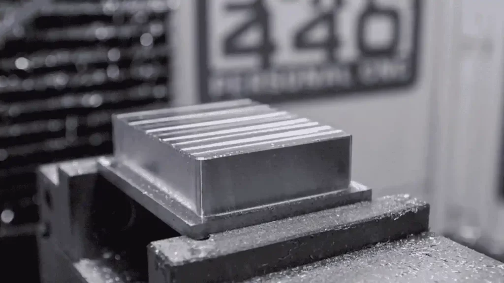 A machined part showing a surface finished by face milling.