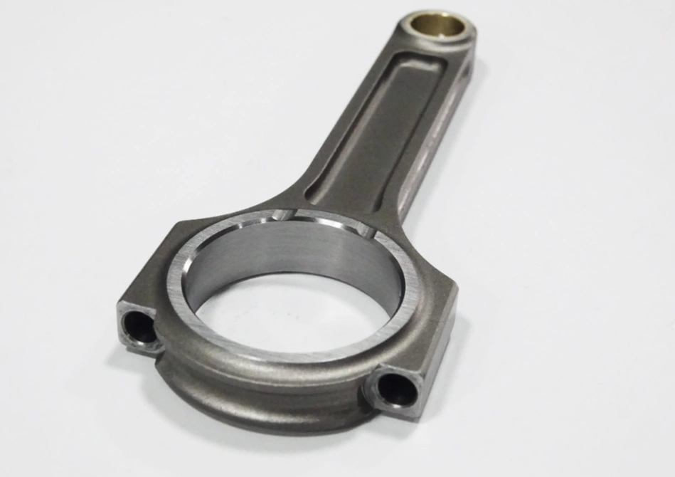 Forged aluminum engine connecting rod with precision-machined bearing surface on white background