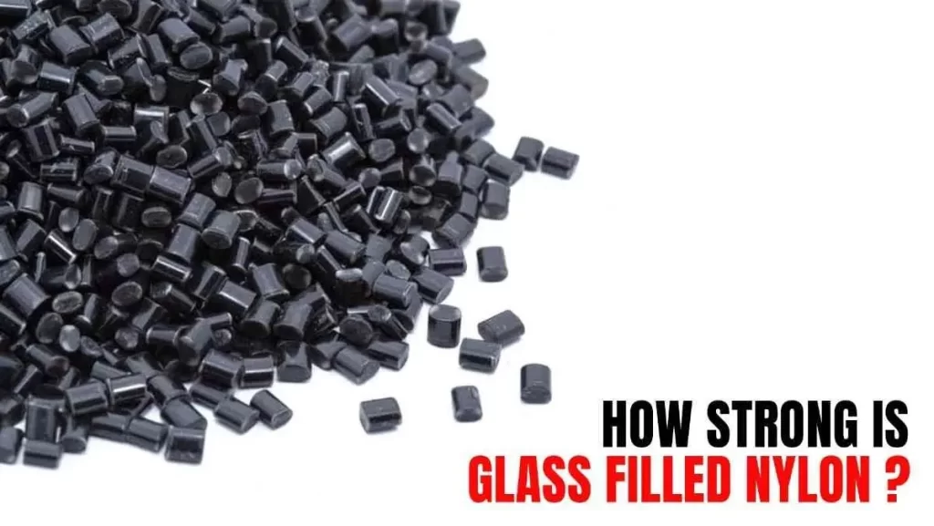 A large pile of small, black cylindrical plastic pellets