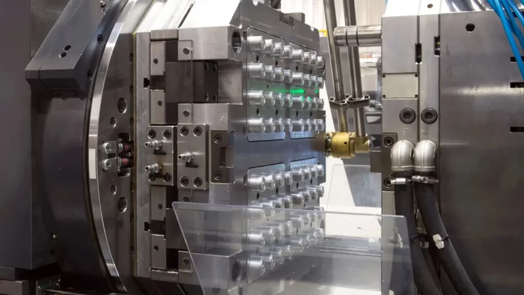 A detailed view of an industrial injection molding machine