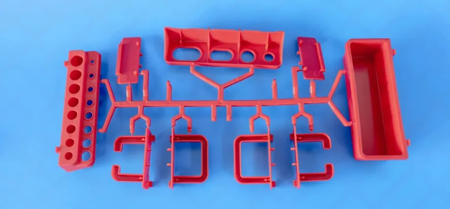 Injection molded parts with gate and runner attached