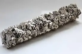 Close-up of a lightweight metal rod with a porous structure.