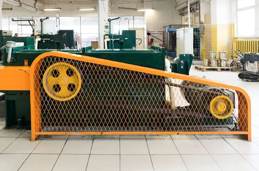 Sheet metal safety barrier frame for machine guarding in a manufacturing facility   