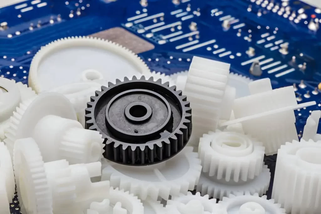 The image shows a close-up view of nylon gear parts.
