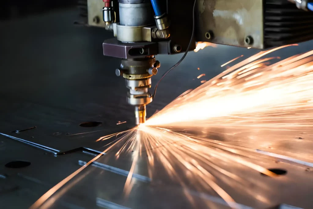 A laser cutting machine precisely cuts through a metal sheet.
