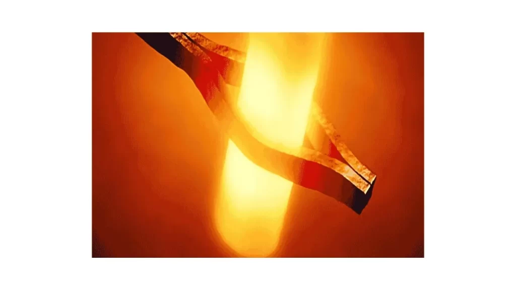 Steel rod with a holder, appearing to be quenched after heat treatment.