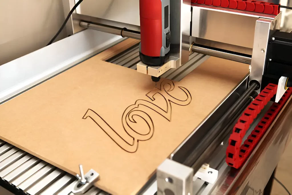 The word “Love” engraved on a wooden surface. 