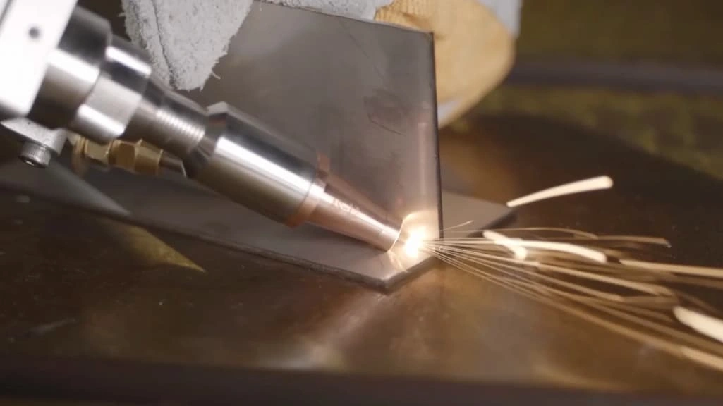 An image showing a laser welding machine joining the titanium parts 