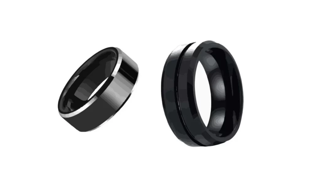 The image shows a pair of tungsten carbide rings placed side by side.